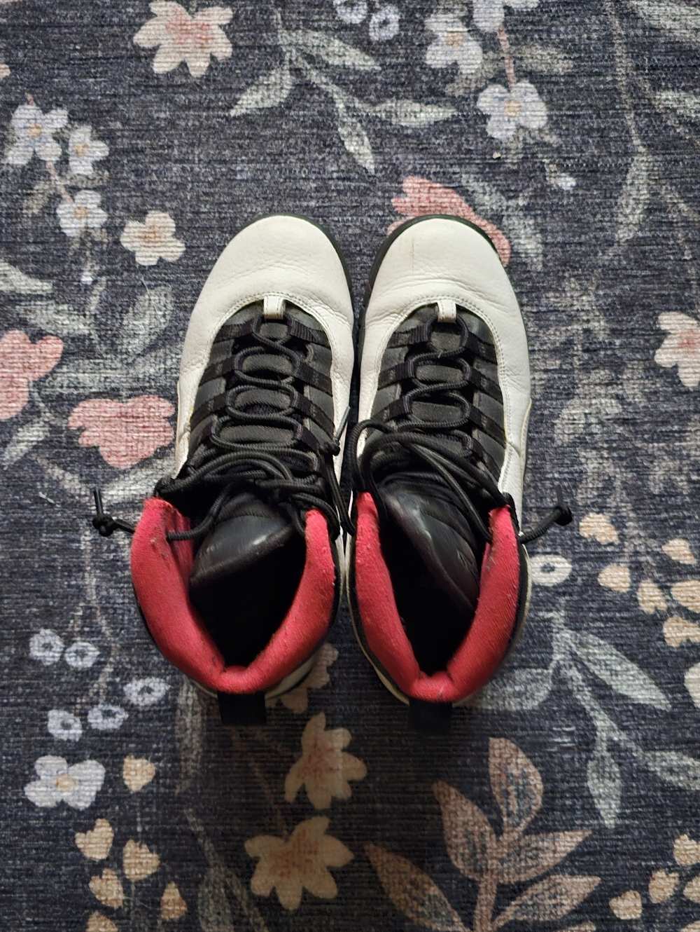 White and Black High-Top Sneakers with Pink Lining